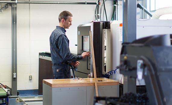 machinist working with equipment